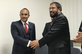 Former Vice President Dr Mohamed Jameel Ahmed (L) with Jumhoory Party's leader Qasim Ibrahim (R), after Dr Jameel joined the party in Frankfurt, Germany --