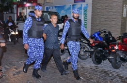 Thimarafushi MDP leader Anwar being taken away by the Police.