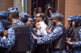 Police bar MP Hussain Ali from entering the parliament. PHOTO/MIHAARU/NISHAN ALI