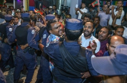 Police breaking up an opposition gathering near MDP main Hub.