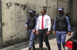 Galolhu South MP Ahmed Mahloof escorted away by the police.