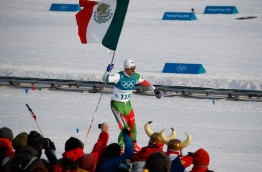 Mexico's German Madrazo crosses the finish line in the men's 15km cross country freestyle at the Alpensia cross country ski centre during the Pyeongchang 2018 Winter Olympic Games on February 16, 2018 in Pyeongchang. / AFP PHOTO / Odd ANDERSEN