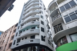 A building in Male : A young man fell to his death after falling from this building on March 11.