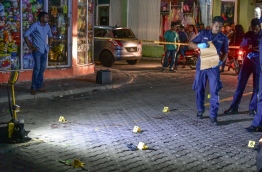 Police officers at the crime scene. PHOTO/MIHAARU