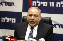 Israeli Defence Minister Avigdor Lieberman addresses members of the Yisrael Beiteinu party in the Knesset in Jerusalem on March 12, 2018. / AFP PHOTO / MENAHEM KAHANA