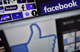 Facebook said on March 20, 2018 it is 'outraged' by misuse of data by Cambridge Analytica, the British firm at the centre of a major data scandal rocking Facebook, who suspended its chief executive as lawmakers demanded answers from the social media giant over the breach. / AFP PHOTO / LOIC VENANCE