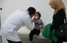 The Ankara centre's medical team is partly made up of Syrian refugees. / AFP PHOTO / ADEM ALTAN