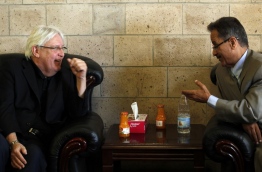The newly appointed Umited Nations envoy to Yemen, Martin Griffiths (L), listens to the under-secretary of Huthi-led government's foreign ministry, Faisal Amin Abu-Rass upon his arrival at Sanaa airport in Sanaa, on March 24, 2018. / AFP PHOTO / MOHAMMED HUWAIS