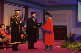 The student receiving a PhD from MNU --