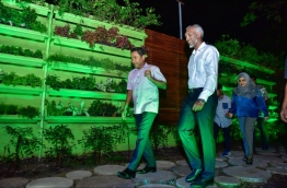 President Abdulla Yameen (L) and Minister of Housing Dr Mohamed Muizzu (R) at the newly developed 'Rasrani Bageecha' on its inaugurating night. MIHAARU PHOTO / NISHAN ALI