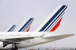 Air France's employees will go on strike on April 3, 2018 for the fourth time in a month to demand a six-percent general wage increase. / AFP PHOTO / ERIC PIERMONT