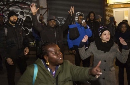 Crowds gathered on the streets of Brooklyn to protest about the shooting on Wednesday. | Kevin Hagen/AP