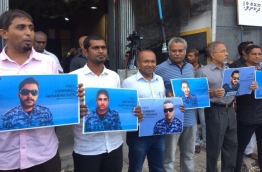 Members and supporters of MDP during a rally, holding posters of the police officers that were arrested after the Supreme Court's ruling on February 1, 2018.