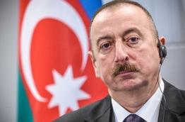 Azerbaijan President Ilham Aliyev is set to secure a fourth consecutive term on on April 11, 2018 in snap polls boycotted by the oil-rich nation's main opposition parties. Aliyev, 56, was first elected president in 2003, after the death of his father Heydar Aliyev, a former KGB officer and communist-era leader who had ruled Azerbaijan with an iron fist since 1993. / AFP PHOTO / Ilmars ZNOTINS / TO GO WITH AFP STORY BY Elman Mamedov