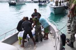 The body of Ahmed Mohamed, 37, who went missing after a speedboat accident on April 19, 2018, brought to Male in a Coast Guard vessel. PHOTO/MNDF