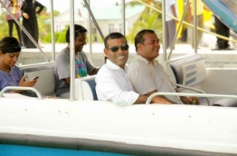 Former President Mohamed Nasheed pictured with the Hithadhoo-North MP Ahmed Aslam during the presidential election campaign in 2013 --