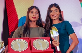 Local Women's Doubles badminton champions Fathimath Nabaaha Abdul Razzaq (R) who won Best Individual Sports Player, and Aminath Nabeeha Abdul Razzaq, who won Mihaaru Sports Awards Most Promising Individual Sports Player and third place in Individual Sports. PHOTO/IMAGES.MV