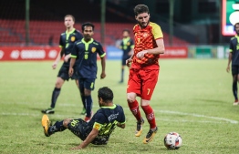 Spanish Midfielder Angel Carrascosa Munoz (R) of Victory Sports Club during a match against United Victory in the STO Male League 2018. PHOTO: NISHAN ALI/MIHAARU