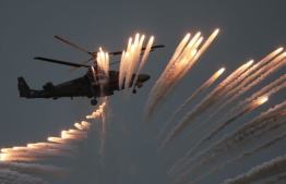 A Russian military Ka-52 helicopter conducting air strikes in exercises in 2016. PHOTO: TASS