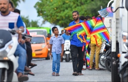 Male: People fly kites at the helipad site on the southern coast of the capital city; kite flying has long been a form of entertainment during the month of Ramadan in the Maldives. PHOTO: HUSSAIN WAHEED/MIHAARU