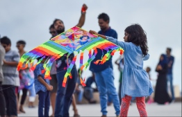 Male: People fly kites at the helipad site on the southern coast of the capital city; kite flying has long been a form of entertainment during the month of Ramadan in the Maldives. PHOTO: HUSSAIN WAHEED/MIHAARU