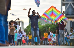 Male: People fly kites at the helipad site on the southern coast of the capital city; kite flying has long been a form of entertainment during the month of Ramadan in the Maldives. PHOTO: HUSSAIN WAHEED/MIHAARU