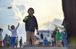 Male: People fly kites at the helipad site on the southern coast of the capital city; kite flying has long been a form of entertainment during the month of Ramadan in the Maldives. PHOTO: HUSSAIN WAHEED/MIHAARU