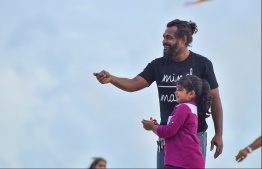 Male: People fly kites at the helipad site on the southern coast of the capital city; kite flying has long been a form of entertainment during the month of Ramadan in the Maldives. PHOTO: HUSSAIN WAHEED/MIHAARU