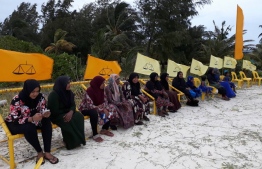 Women of HA. Kelaa participate in an event of MDP's presidential campaign "Jazeera Raajje" on June 13, 2018.