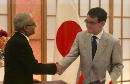 Minister of Foreign Affairs of Maldives Dr Mohamed Asim (L) and Minister of Foreign Affairs of Japan Taro Kono (R) after signing the grant assistance agreement under the Japanese Economic and Social Development Cooperation Programme, at the foreign ministry headquarters in Japan on June 15, 2018. PHOTO: MINISTRY OF FOREIGN AFFAIRS