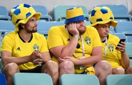 Sweden fans react to the result of the Russia 2018 World Cup Group F football match between Germany and Sweden at the Fisht Stadium in Sochi on June 23, 2018. / AFP PHOTO / Jonathan NACKSTRAND / 