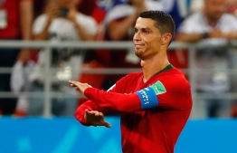 Portugal's forward Cristiano Ronaldo reacts during the Russia 2018 World Cup Group B football match between Iran and Portugal at the Mordovia Arena in Saransk on June 25, 2018. / AFP PHOTO / Jack GUEZ / 