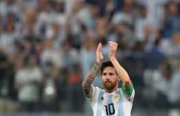 Argentina's forward Lionel Messi reacts after victory during the Russia 2018 World Cup Group D football match between Nigeria and Argentina at the Saint Petersburg Stadium in Saint Petersburg on June 26, 2018. This week, in 2022, he was key in bringing Argentina back to life, as the team squeezed past Bolivia, Ecuador hammer Uruguay in the World Cup Qualifiers for 2022. AFP PHOTO: AFP / GABRIEL BOUYS 