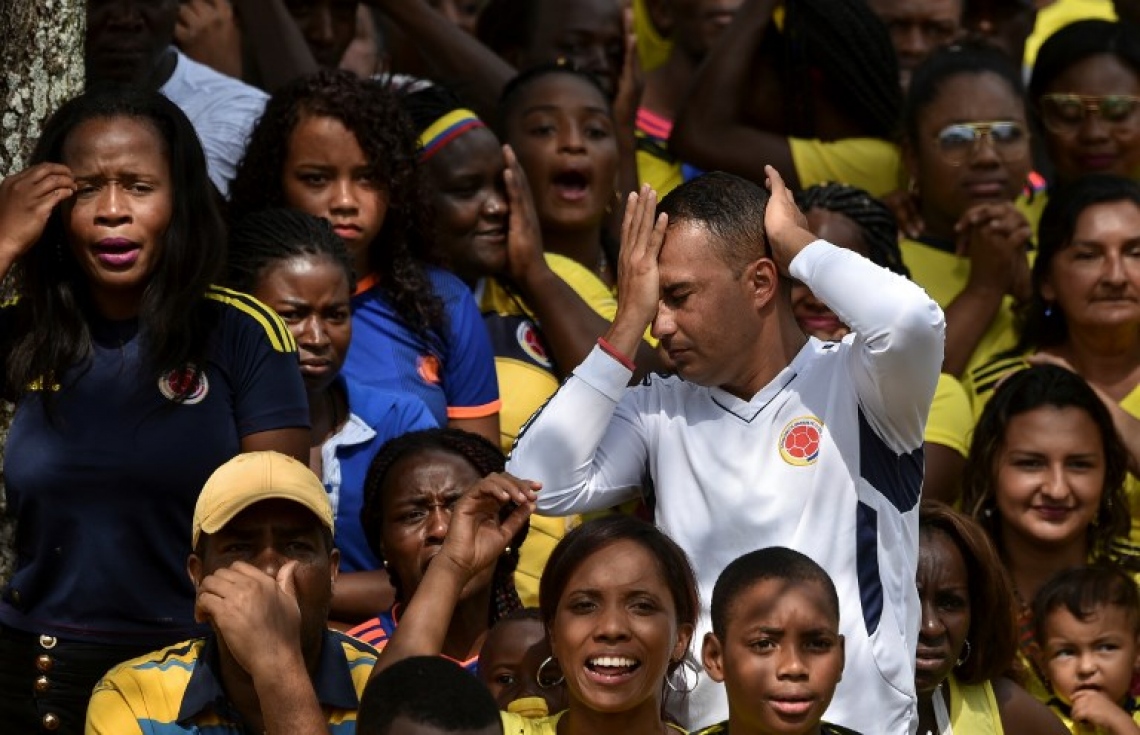 މޮސްކޯ: ޖުލައި 3، 2018: ވޯލްޑް ކަޕް ފުޓްބޯޅަ މުބާރާތުގައި އިންގްލެންޑް އާ ކޮލަމްބިއާ ކުޅުނު މެޗުގައި ކޮލަމްބިއާގެ ސަޕޯޓަރުންތަކެއް: ވޯލްޑް ކަޕް ފުޓްބޯޅަ މުބާރާތުގައި ޕެނަލްޓީ ޖަހައިގެން ކޮލަމްބިއާ އަތުން 4-3 އިން މޮޅުވެ އިންގްލެންޑް މުބާރާތުގެ ކުއާޓާ ފައިނަލުން ވަނީ ފުރުސަތު ހޯދައިފައި.-- ފޮޓޯ: އޭއެފްޕީ