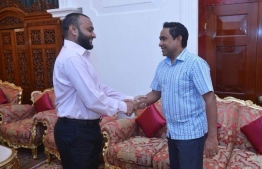 President Abdulla Yameen shakes hands with Dr. Mohamed Shaheem Ali Saeed, who was appointed as the president's running mate for the Presidential Election 2018.