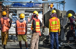 Expatriate workers at a construction site. PHOTO/MIHAARU