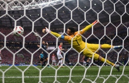 France's goalkeeper Hugo Lloris tries to save a shot during the Russia 2018 World Cup final football match between France and Croatia at the Luzhniki Stadium in Moscow on July 15, 2018.  Jewel SAMAD / AFP