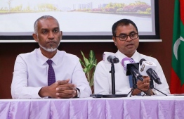 Housing Minister Dr. Mohamed Muizzu (L) and Environment Minister Thoriq Ibrahim speak at press conference about the USD 40 million loan granted by OPEC Fund for International Development to the Maldives. PHOTO/MIHAARU