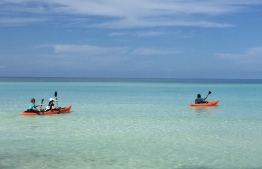 Take a fun canoeing excursion at Reveries Diving Village at L.Gan. PHOTO: REVERIES DIVING VILLAGE / THE EDITION