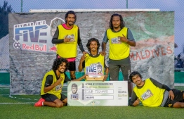 Club Teenage poses with Neymar Jr's Five Boarding Pass: the defending champions are flying out to Brazil on July 18, 2018 to participate in the tournament's World Finals. PHOTO: MOHAMED AHSAN/RED BULL MALDIVES