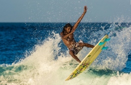 Fuku shows off his considerable surfing skill, riding local waves. PHOTO: FACEBOOK / SURFING RAALHUGANDU