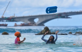artificial beach children kids playing  swimming male-hulhumale bridge girls