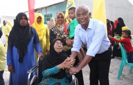 Opposition coalition presidential candidate Ibrahim Mohamed Solih (Ibu) greets the people of Kulhudhuffushi during his campaign trail to Haa Dhaalu Atoll. PHOTO/MIHAARU