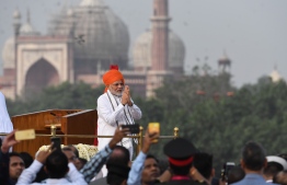 Indian Prime Minister Narendra Modi gestures a traditional greeting prior to his speech as part of India's 72nd Independence Day celebrations, which marks the 71st anniversary of the end of British colonial rule, at the Red Fort in New Delhi on August 15, 2018.
India will send a manned mission into space by 2022, Prime Minister Narendra Modi announced August 15 in a speech to the nation for the country's Independence Day. / AFP PHOTO / PRAKASH SINGH