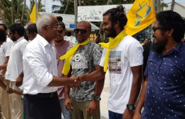 Opposition coalition's presidential candidate Ibrahim Mohamed Solih (Ibu) is warmly received at K. Maafushi during his campaign trip. PHOTO/MIHAARU