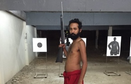 Sri Nirmaldeep Singh Sidhu or Bodhi Singh pictured with a gun. PHOTO/SOCIAL MEDIA