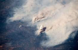 This handout picture obtained from the European Space Agency (ESA) on August 7, 2018 shows a view taken by German astronaut and geophysicist Alexander Gerst, showing wildfires in the state of California as seen from the International Space Station on August 2, 2018. PHOTO | EUROPEAN SPACE AGENCY | AFP