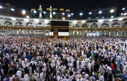 Muslim worshippers perform prayers around the Kaaba, Islam's holiest shrine, at the Grand Mosque in Saudi Arabia's holy city of Mecca on August 17, 2018 prior to the start of the annual Hajj pilgrimage in the holy city.
Muslims from across the world are gathering in Mecca in Saudi Arabia for the annual hajj pilgrimage, one of the five pillars of Islam. / AFP PHOTO / AHMAD AL-RUBAYE