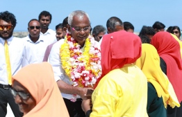 Ibu being greeted by supporters. PHOTO: MDP