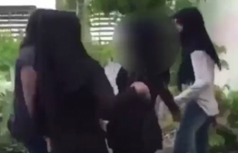 A screenshot of the video depicting the gang attack on 15-year-old Nashfa Hassan.